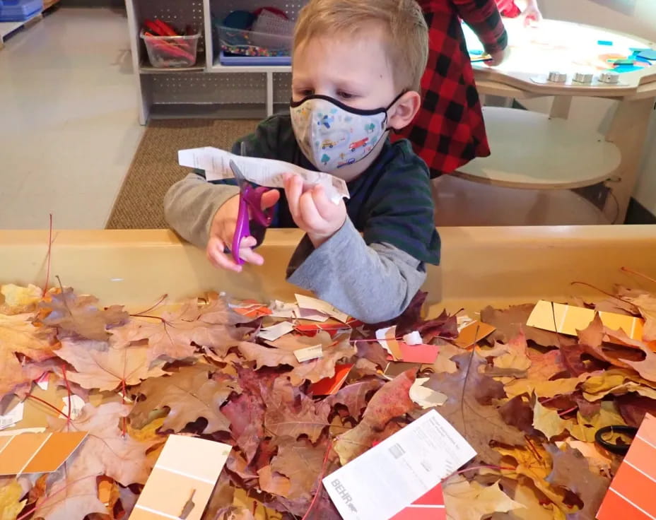 a baby playing with a toy