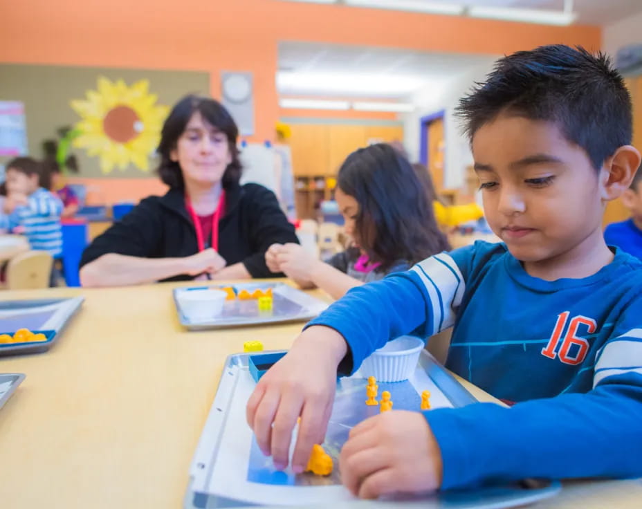 a group of children in a classroom