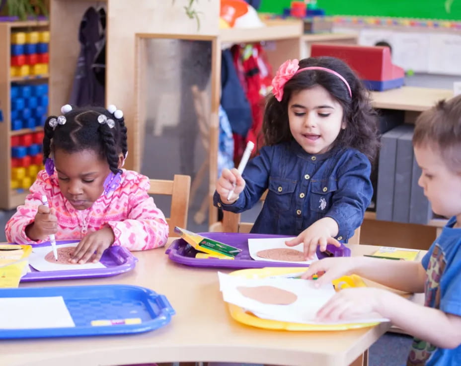 children sitting at a table