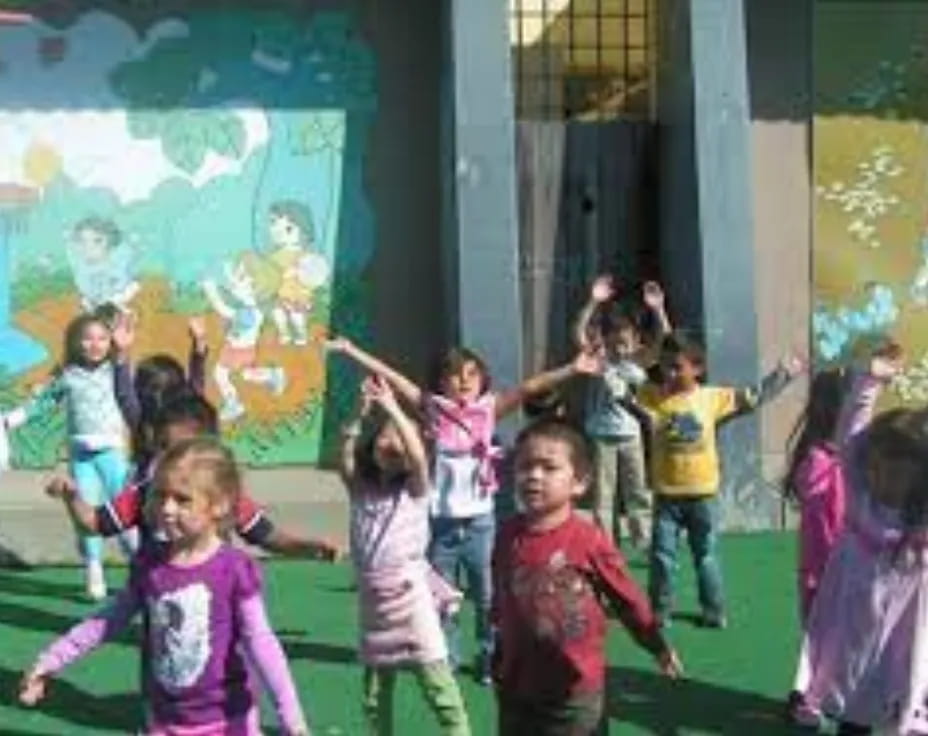 a group of children dancing