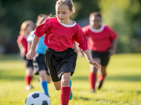 a girl playing football