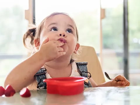 a baby eating food
