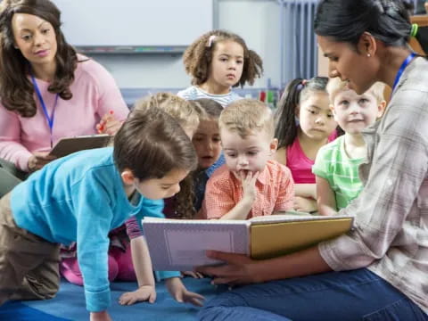 a teacher reading to her students