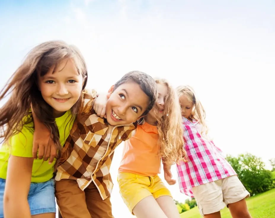 a group of girls smiling
