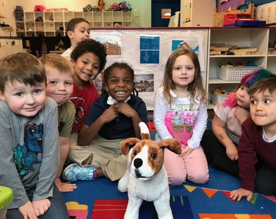 a group of children and a dog