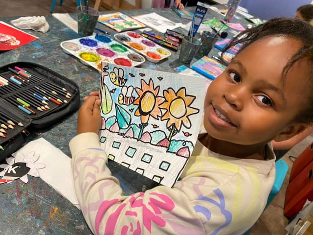 a child holding a book