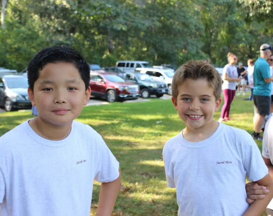 two boys standing together