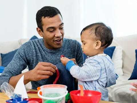 a person holding a baby