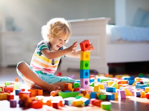 a child playing with blocks
