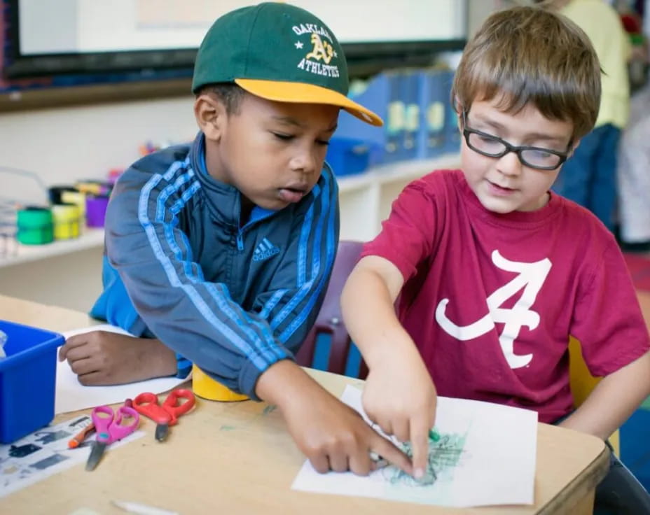 a couple of boys playing with toys