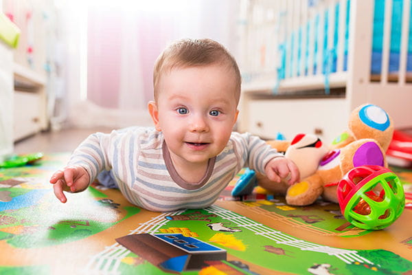a baby playing with toys