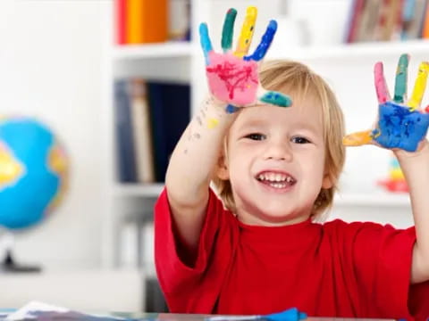a child with a bow on her head
