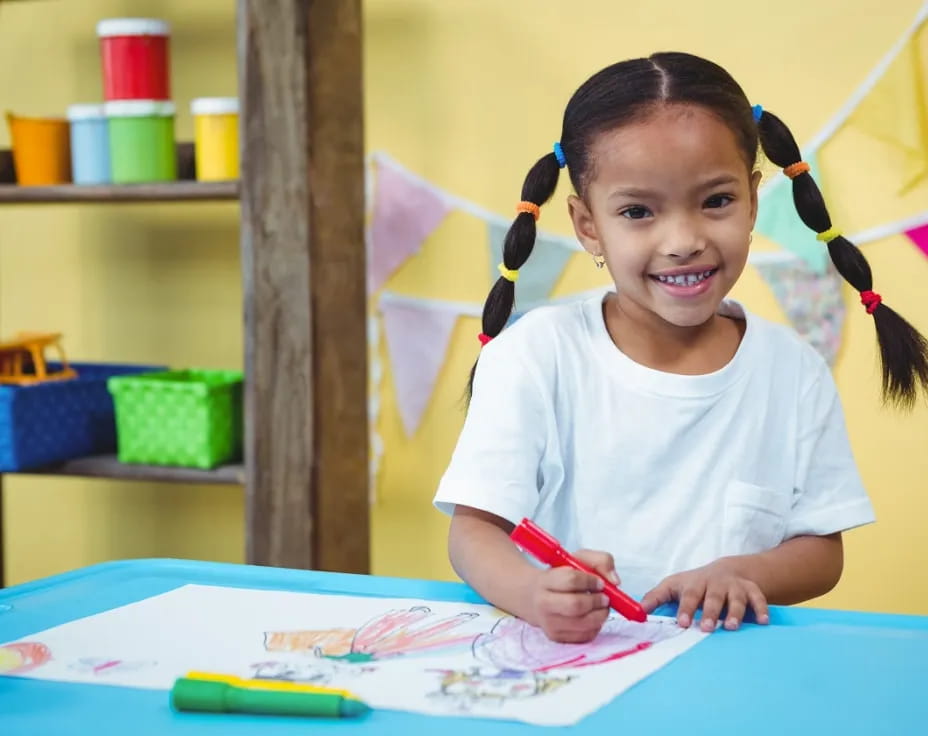 a young girl painting