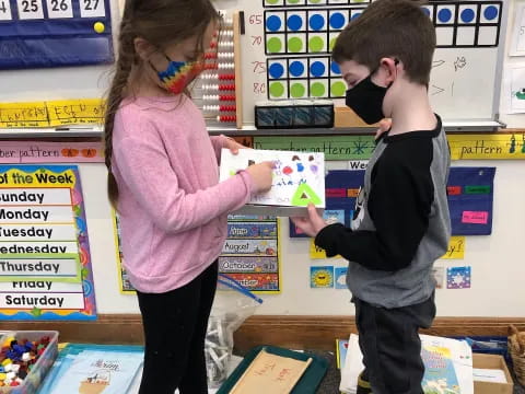 a person and a boy in a store