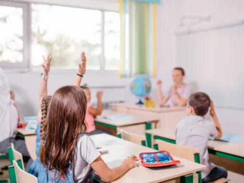 a group of people in a classroom