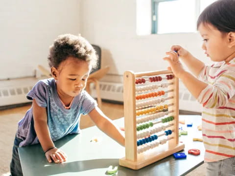 a few children playing with a toy
