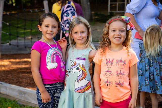 a group of girls posing for a picture