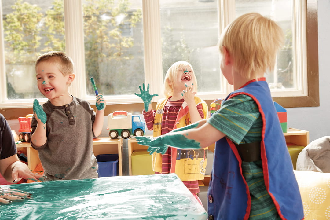 a group of kids playing with toys