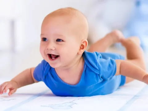 a baby crawling on a table