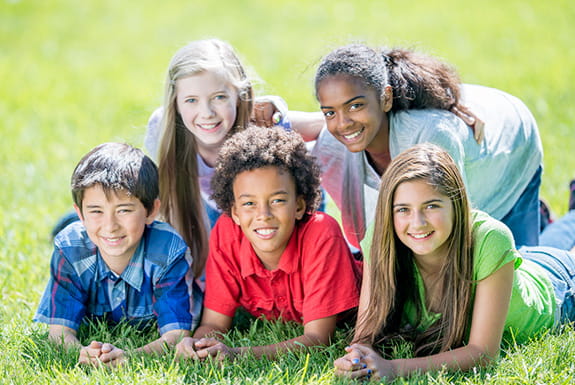 a group of children smiling