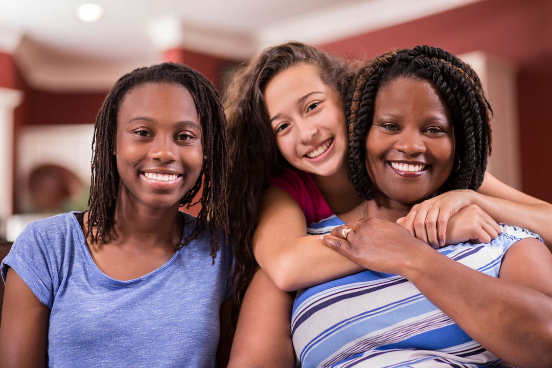 a group of women smiling