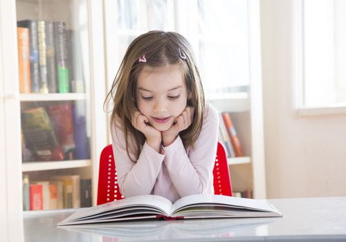 a girl reading a book