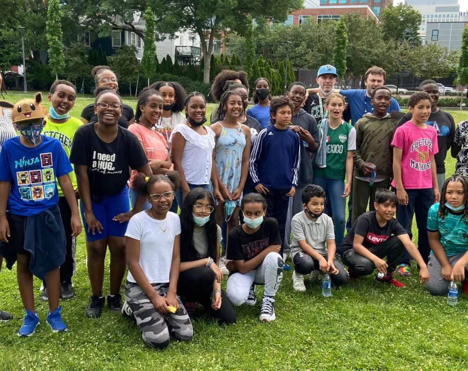 a group of people posing for a photo