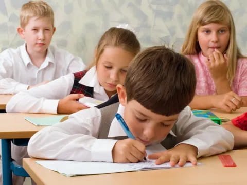 a group of children in a classroom