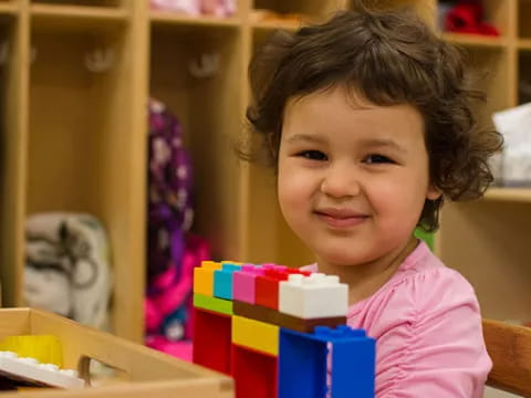a child smiling for the camera