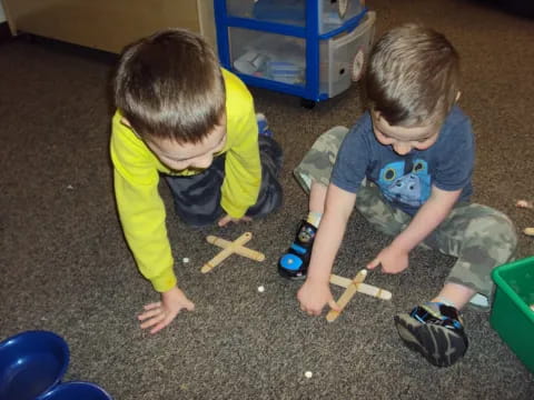 a couple of kids playing with toys