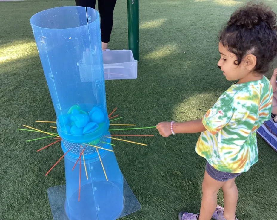 a child playing with a toy