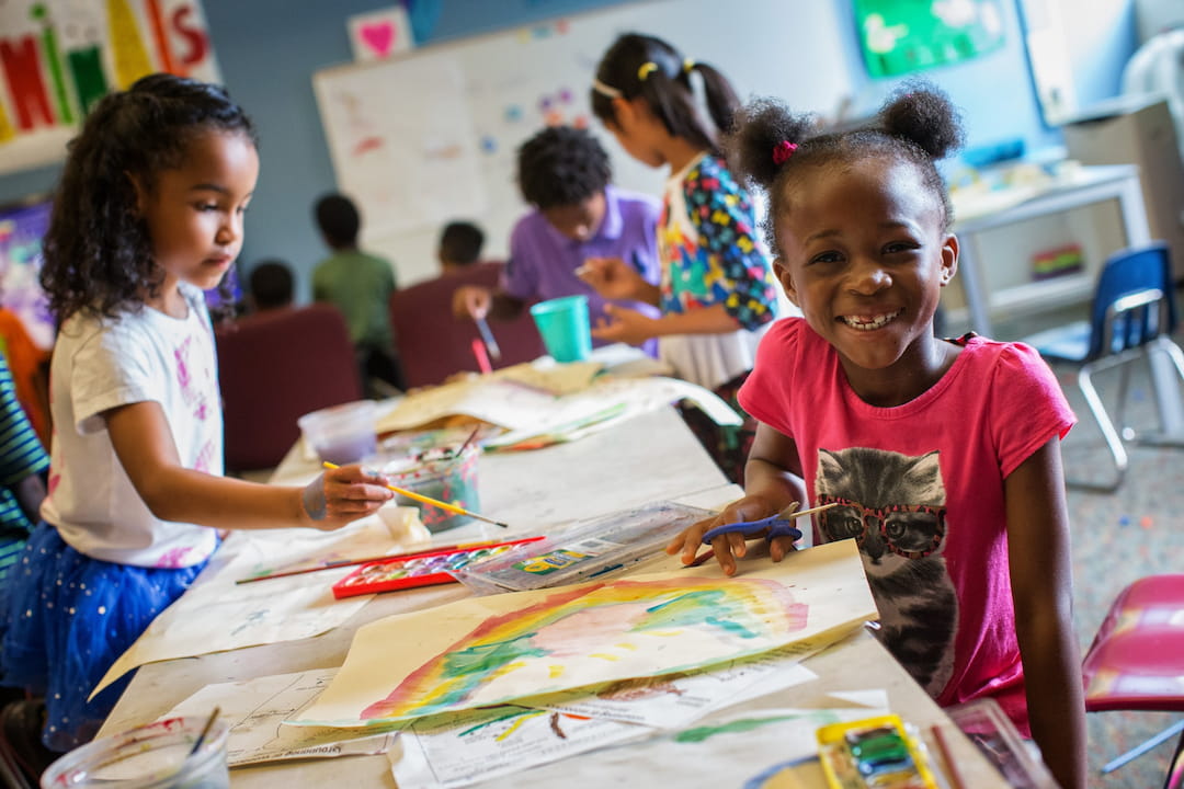 a group of children in a classroom