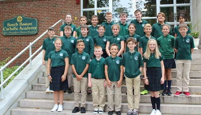 a group of people posing for a photo