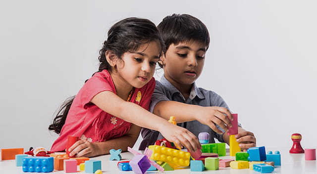 a few children playing with toys