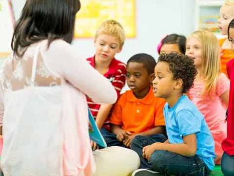a person and a group of children