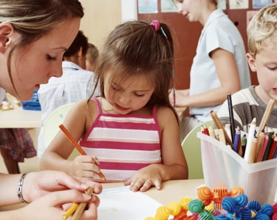 a group of children painting