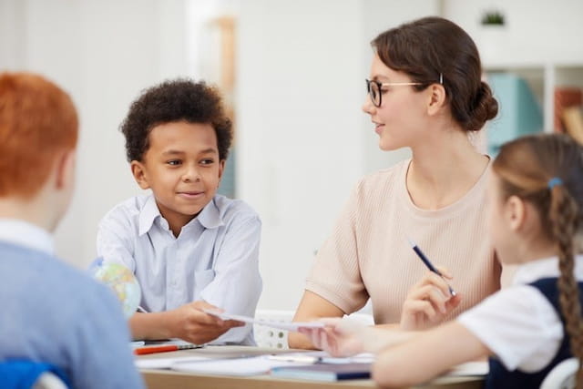 a teacher and her students