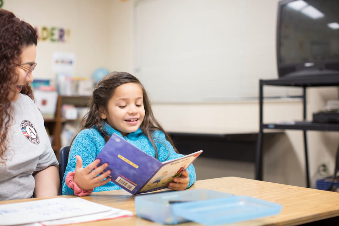 a girl reading a book