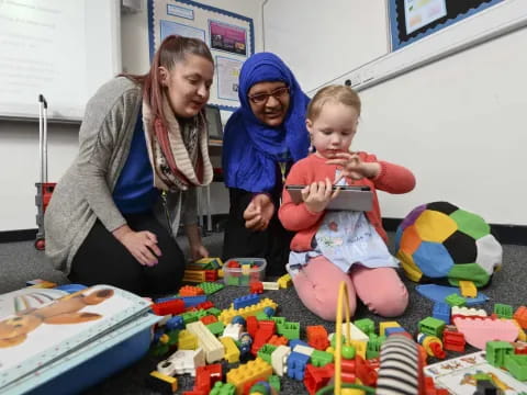 a person and a couple of children