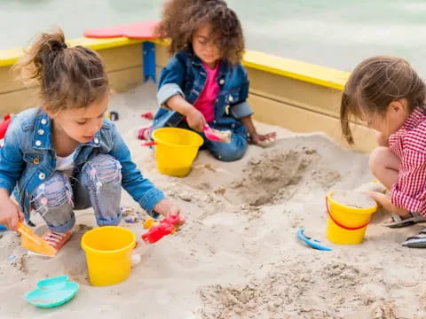 children playing in sand