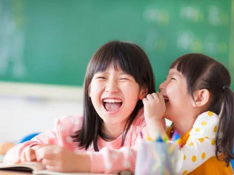 a few young girls laughing