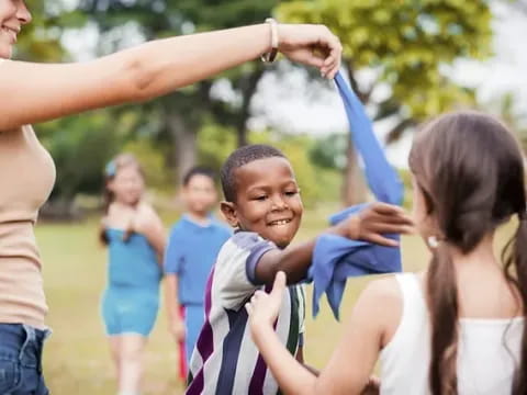 a group of people holding hands