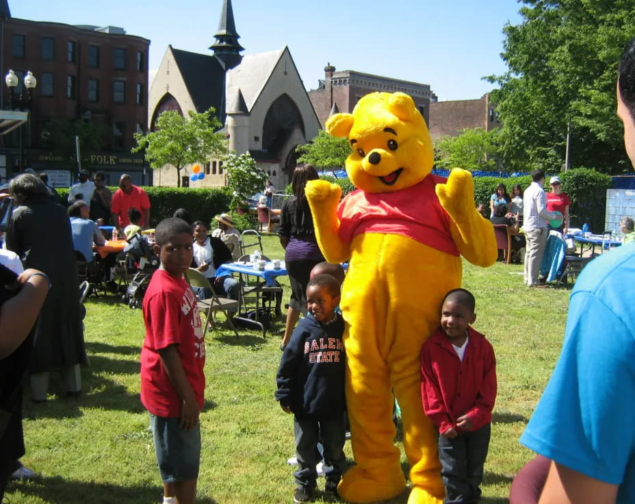 a person in a garment with children