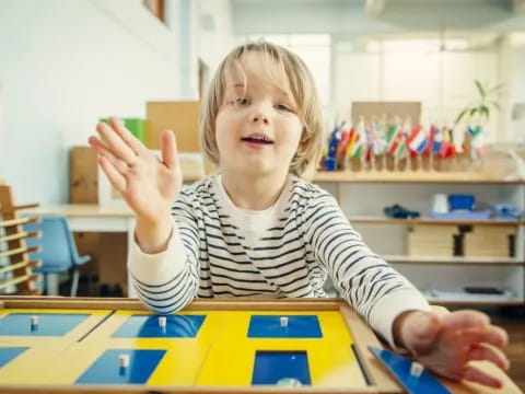 a child sitting at a table