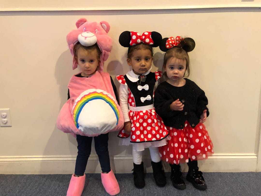 a group of children wearing clothing