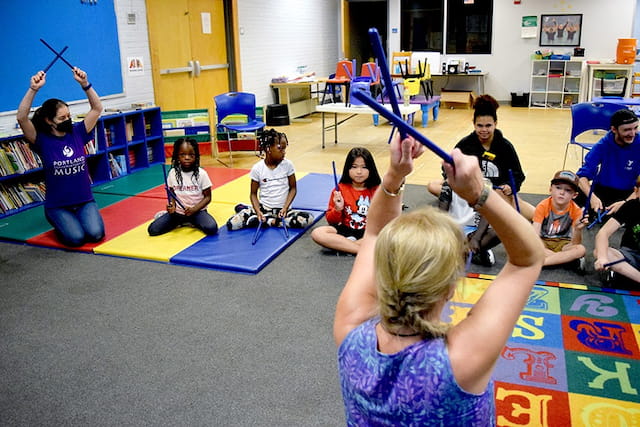 a group of people in a classroom
