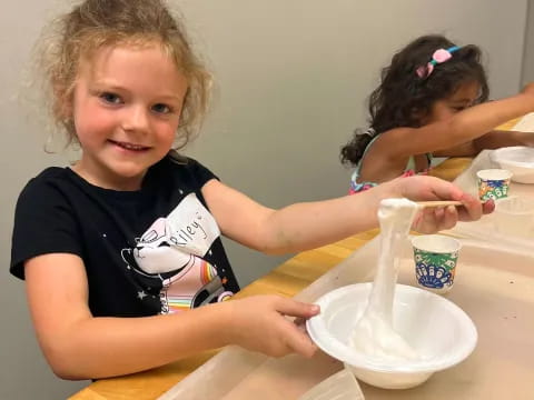 a young girl making a face