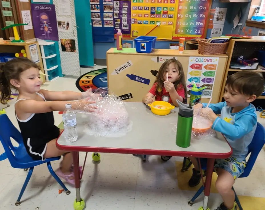 children sitting at a table