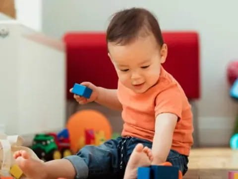 a child sitting on a chair