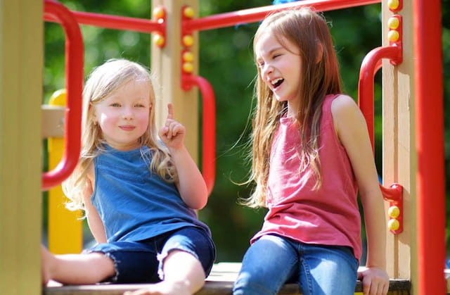 two girls on a playground